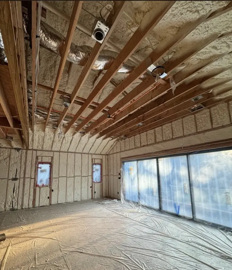 Interior walls and ceiling insulated with spray foam during new construction in Philadelphia